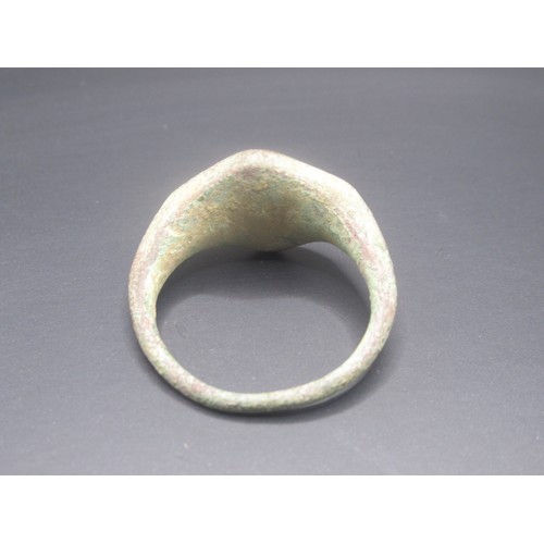 205 - A complete copper-alloy signet type finger ring of Post-Medieval date, c. AD 1400 - 1600. The upper ... 