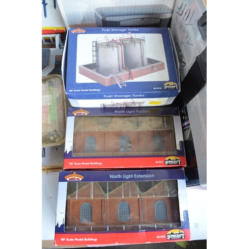 67 - Collection of mostly used OO gauge model railways scenic accessories to include buildings (including... 