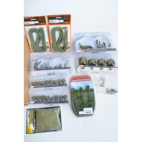 69 - Collection of mostly as new/sealed OO/HO, O and N gauge suitable scenic accessories, various manufac... 