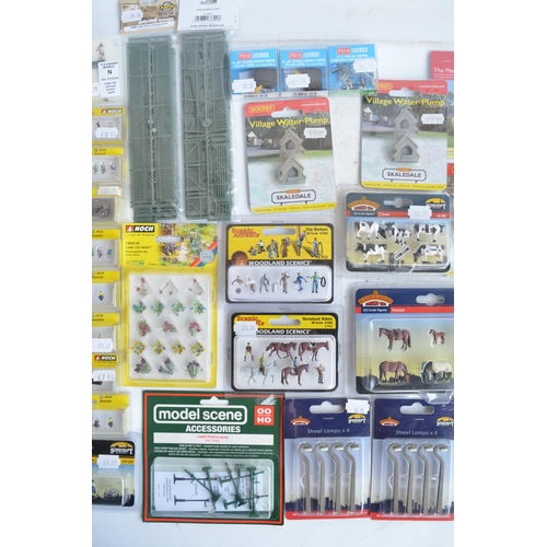 69 - Collection of mostly as new/sealed OO/HO, O and N gauge suitable scenic accessories, various manufac... 