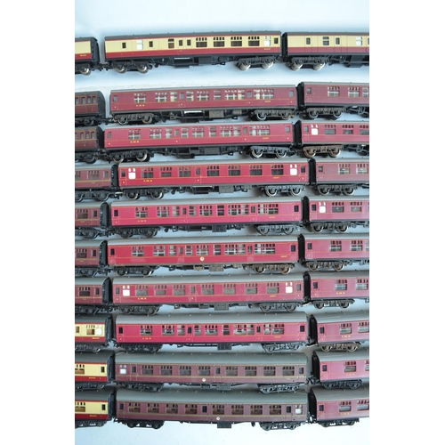 72 - Extensive collection of unboxed previously run OO gauge passenger coaches and goods wagons, various ... 