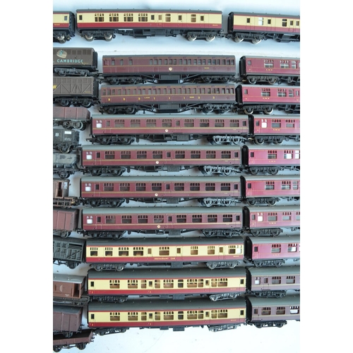 72 - Extensive collection of unboxed previously run OO gauge passenger coaches and goods wagons, various ... 