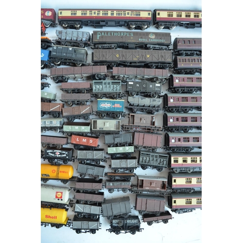 72 - Extensive collection of unboxed previously run OO gauge passenger coaches and goods wagons, various ... 