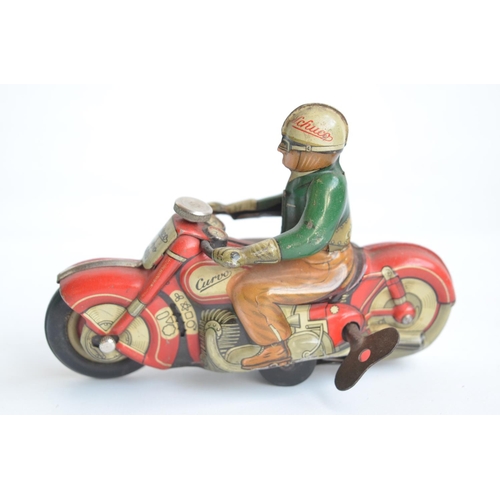 76 - Vintage Schuco Curvo 1000 clockwork litho printed tinplate motorbike model in working order, late 19... 