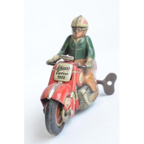 76 - Vintage Schuco Curvo 1000 clockwork litho printed tinplate motorbike model in working order, late 19... 