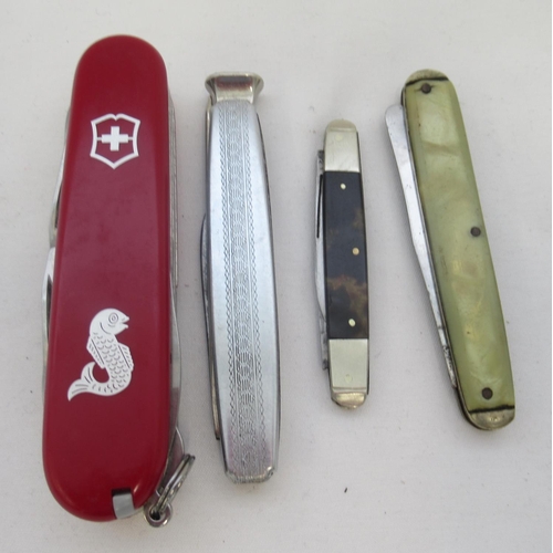 416A - Selection of four vintage pocket knives, including a Victorinox 17-function fishing knife, a tortois... 