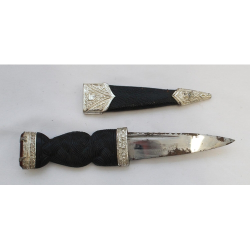 402 - Sgian Dubhs sock knife by J. Nowill and Son. Three grouse feet broaches, a silver and  amber style b... 