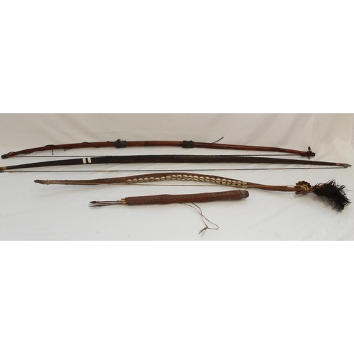 418 - Four bows and a quiver with arrows. From Africa, South America and Fiji