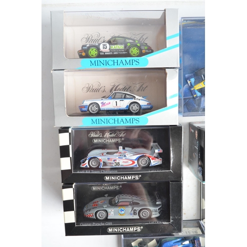 101 - Twenty six boxed/cased 1/43 scale diecast F1 and racing car models from Minichamps, Burago and Onyx,... 