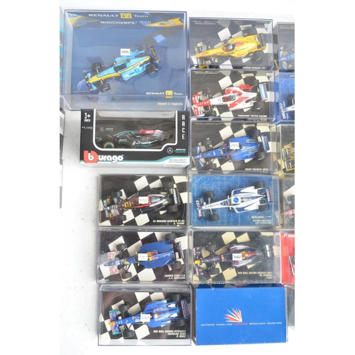 101 - Twenty six boxed/cased 1/43 scale diecast F1 and racing car models from Minichamps, Burago and Onyx,... 