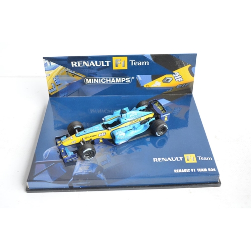 101 - Twenty six boxed/cased 1/43 scale diecast F1 and racing car models from Minichamps, Burago and Onyx,... 