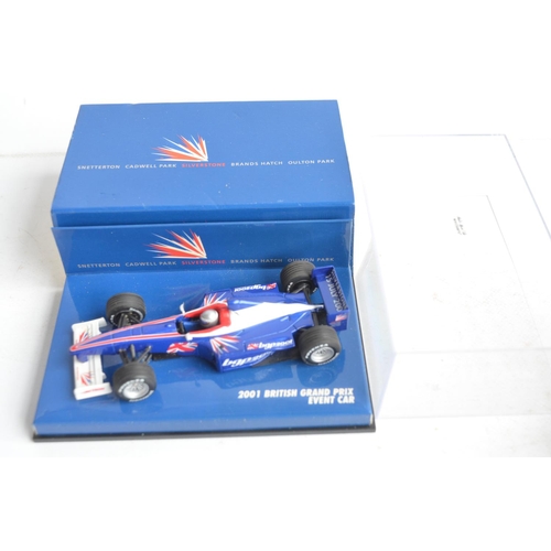 101 - Twenty six boxed/cased 1/43 scale diecast F1 and racing car models from Minichamps, Burago and Onyx,... 