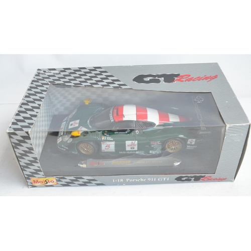 102 - Eight 1/18th scale diecast car models from Burago and Maisto (7x boxed) to include 4x Ferrari's (inc... 