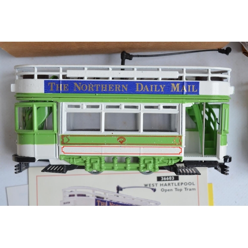 89 - Fifteen boxed Corgi diecast tram models, all appear in at least near mint condition with one excepti... 