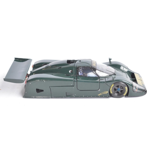 94 - Motorbox highly detailed 1/18th scale Jaguar XJR-9 in good overall condition, please note part of wi... 