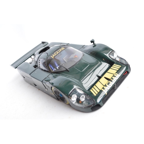 94 - Motorbox highly detailed 1/18th scale Jaguar XJR-9 in good overall condition, please note part of wi... 