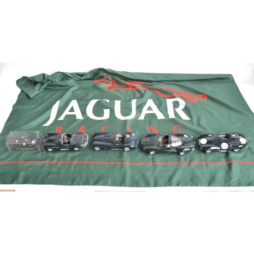 97 - Collection of unboxed 1/18 scale Jaguar car models by Autoart to include an XJ13 (bonnet appears stu... 