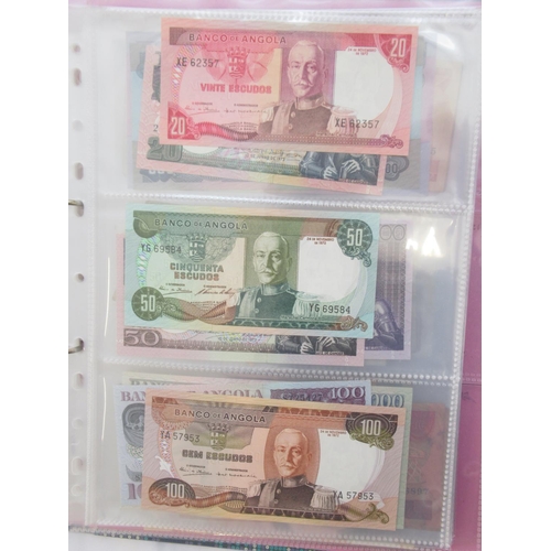 226 - Two folders containing assorted collection of International banknotes from Venezula, Angola, Ghana, ... 