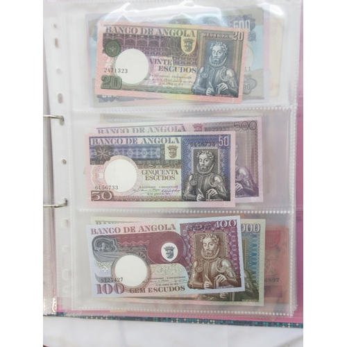 226 - Two folders containing assorted collection of International banknotes from Venezula, Angola, Ghana, ... 