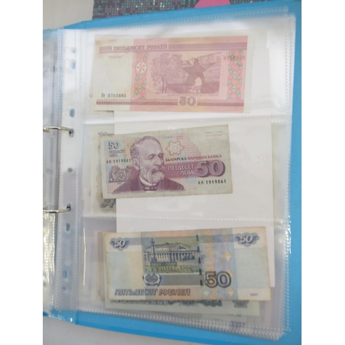 227 - Two folders containing mixed collection of International banknotes to inc. Mongolia, Moldova, Bosnia... 