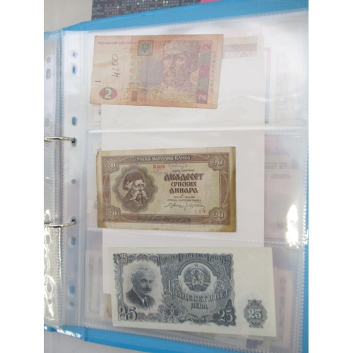 227 - Two folders containing mixed collection of International banknotes to inc. Mongolia, Moldova, Bosnia... 