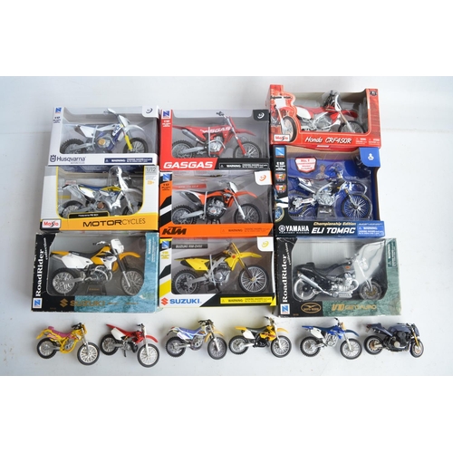 104 - Nine boxed 1/12th scale motocross and road bike models from New Ray and Maisto (models in at least e... 