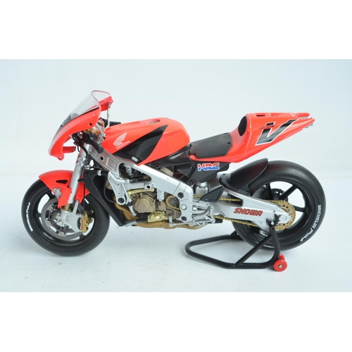 105 - Three large scale motorbike models to include diecast Minichamps 1/12th scale highly detailed Valent... 