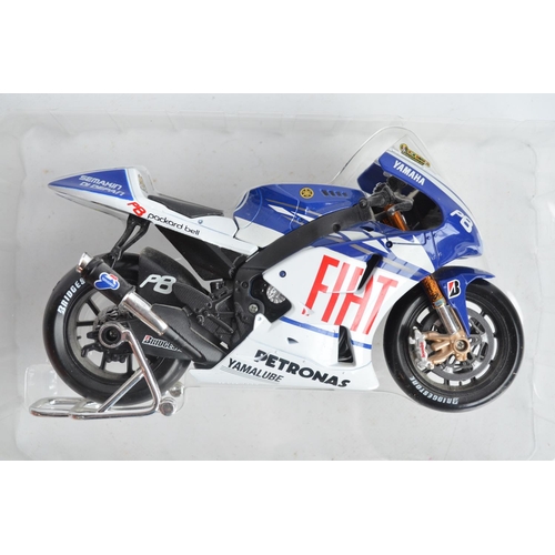 105 - Three large scale motorbike models to include diecast Minichamps 1/12th scale highly detailed Valent... 