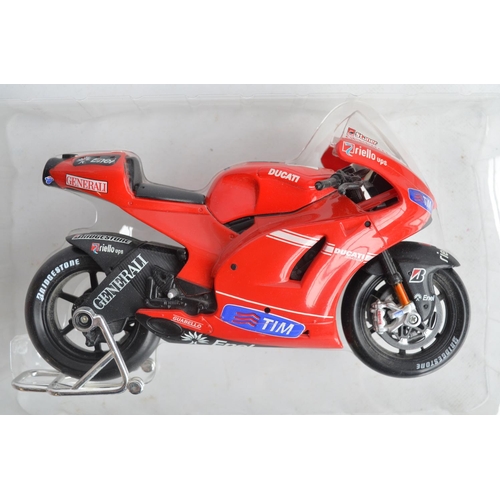 105 - Three large scale motorbike models to include diecast Minichamps 1/12th scale highly detailed Valent... 