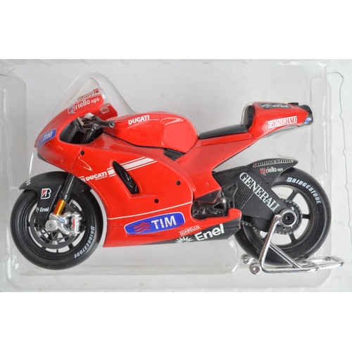 105 - Three large scale motorbike models to include diecast Minichamps 1/12th scale highly detailed Valent... 