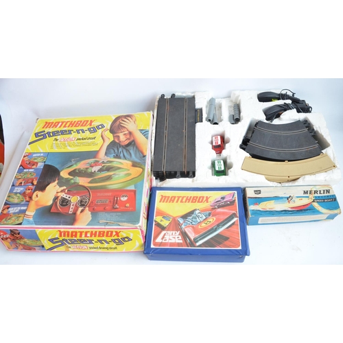 110 - Vintage Sutcliffe Models Merlin battery powered speedboat model, a Matchbox Steer-n-go set (incomple... 