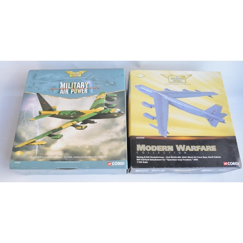 124 - Two Corgi Aviation Archive 1/144 scale diecast Boeing B-52 models, both A/F with damage/repairs, can... 