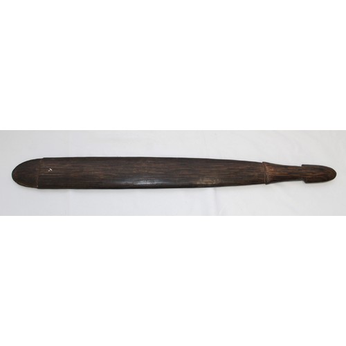 417 - Trobriand Island Sword club of the Massim People. Made from a hard wood carved with traditional scro... 