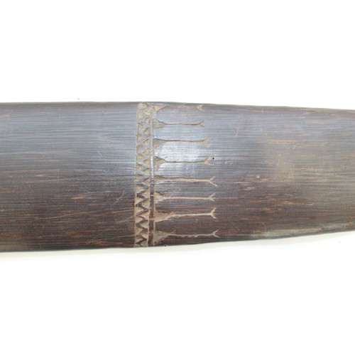 417 - Trobriand Island Sword club of the Massim People. Made from a hard wood carved with traditional scro... 