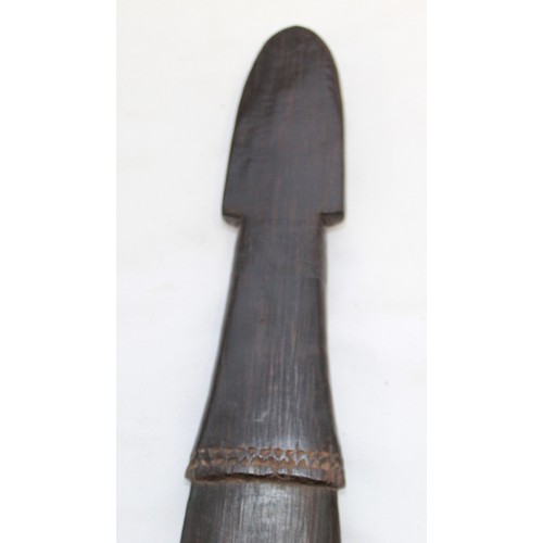 417 - Trobriand Island Sword club of the Massim People. Made from a hard wood carved with traditional scro... 