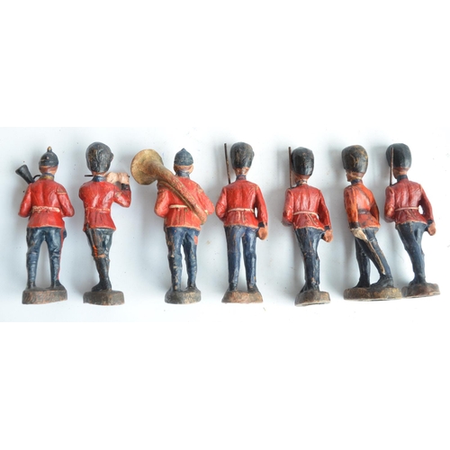 108A - Collection of seven vintage Elastolin toy soldiers (all approx 11cm tall), an Astra metal traffic si... 