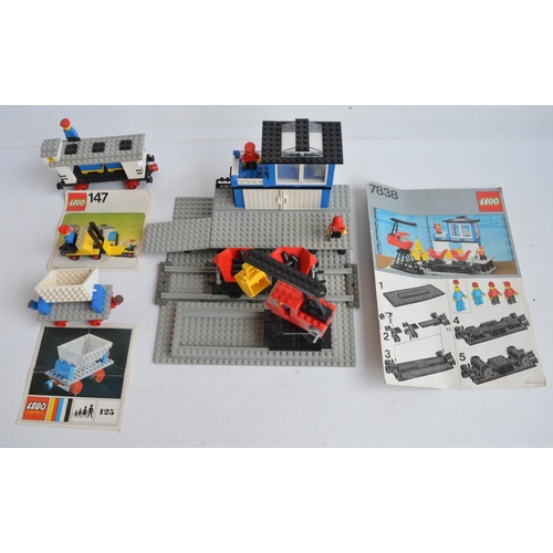 128 - Three vintage unboxed Lego sets with original instructions to include 7838 loading station (1983), 1... 