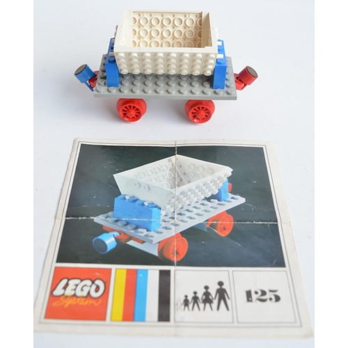 128 - Three vintage unboxed Lego sets with original instructions to include 7838 loading station (1983), 1... 