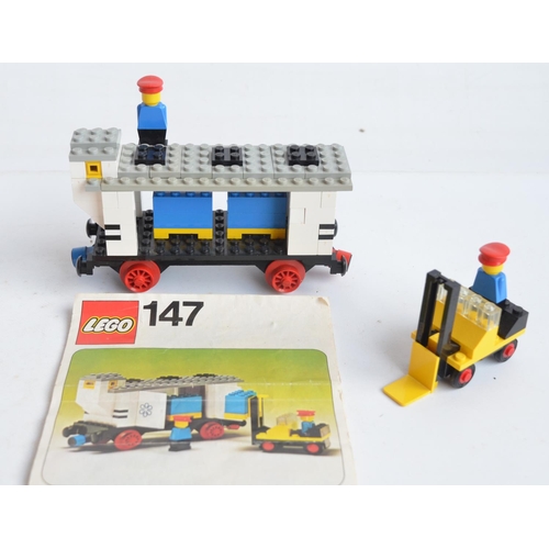 128 - Three vintage unboxed Lego sets with original instructions to include 7838 loading station (1983), 1... 