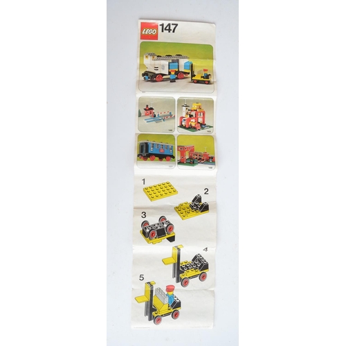 128 - Three vintage unboxed Lego sets with original instructions to include 7838 loading station (1983), 1... 