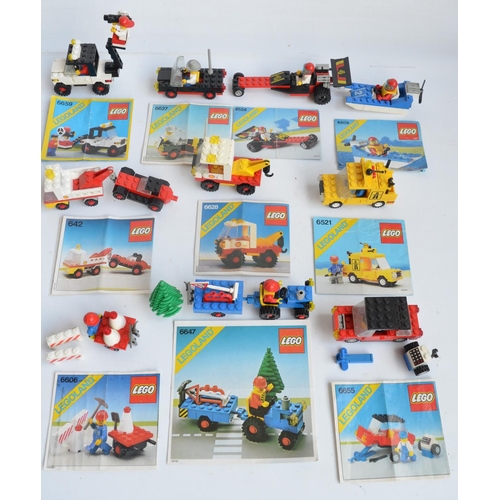 129 - Twenty seven small vintage unboxed Lego/Legoland Lego town sets, all complete and all with original ... 