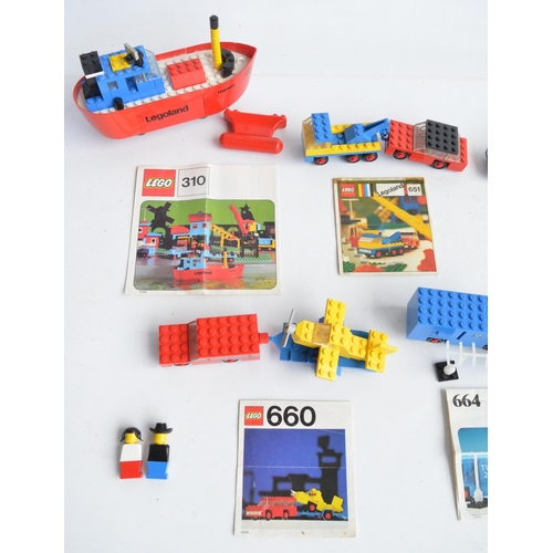 130 - Twelve vintage unboxed small Lego/Legoland Lego Town sets, all sets complete and all with original i... 