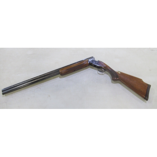 563 - Shotgun certificate required - Miroku O/U single trigger trap shotgun. Floral engraving to lock. Som... 