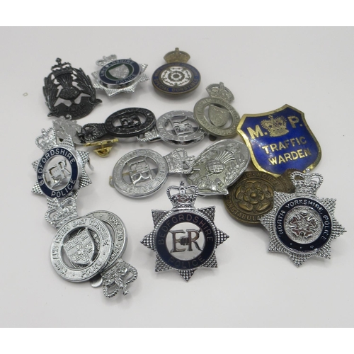 262 - Large selection of police badges and pins from different current and defunct forces across the count... 