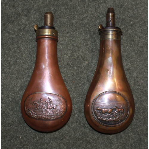 428 - Two Copper and brass powder flasks  by Dixon & Sons depicting 'The Hunt and Pointers on the Moor'