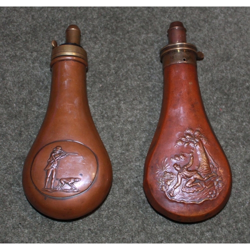 429 - Copper and brass powder flask by Dixon & Sons depicting 'Hunter with Pointer'.
Copper and brass powd... 