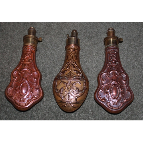 430 - Matching pair of embossed copper and brass powder flasks by Hawksley.
Copper and brass powder flask ... 