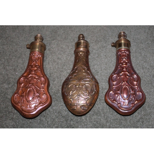 430 - Matching pair of embossed copper and brass powder flasks by Hawksley.
Copper and brass powder flask ... 