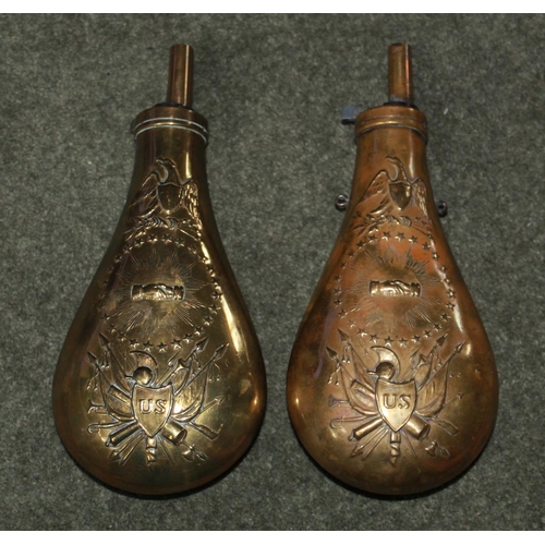 434 - A pair of large, American copper and brass powder flasks, maker unknown, depicting U.S. eagle, shiel... 