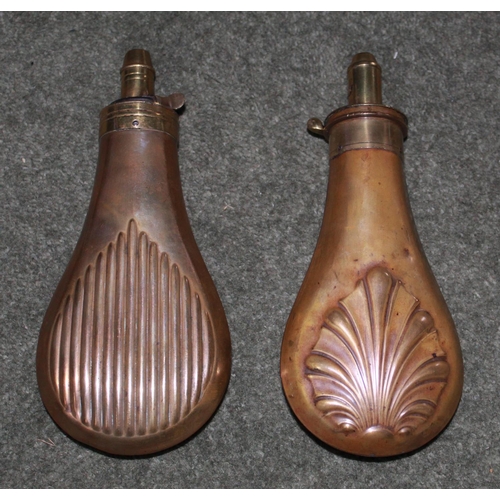 437 - Copper and brass powder flask with fluted leaf design. Copper and brass powder flask with ribbed des... 